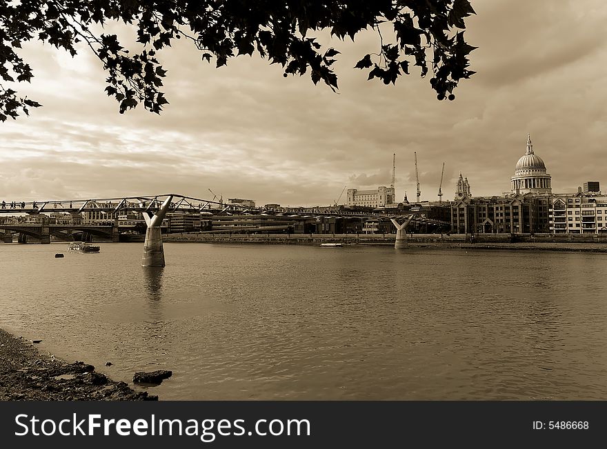 A view of the Thames and St Paul in London. Sepia. A view of the Thames and St Paul in London. Sepia