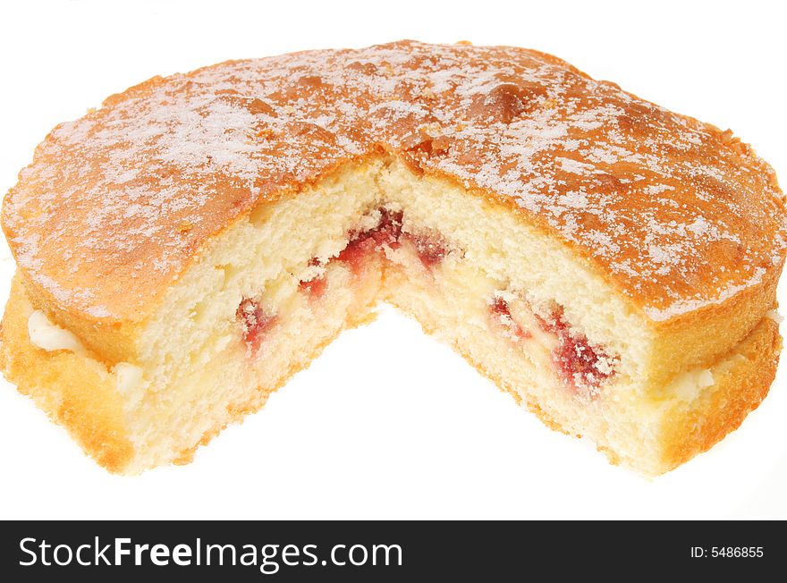 Raspberry sponge cake with slice cut out