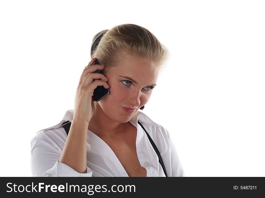 Blond woman talking by mobile phone unhappy