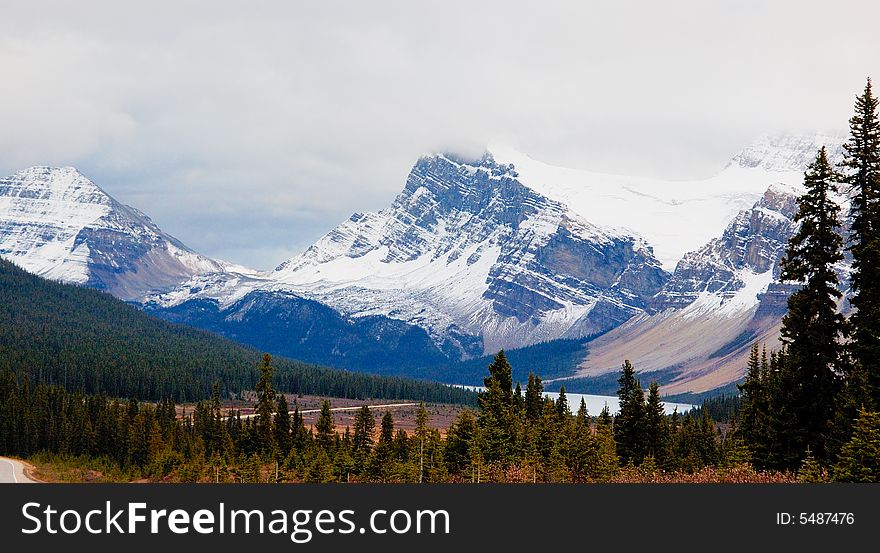 Glacier lake in the mountains in the late fall