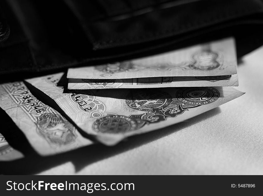 Money in the wallet, black and white photo