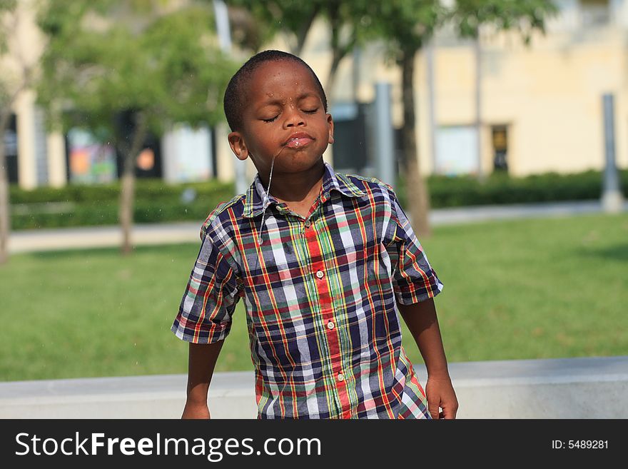 Young boy with drool coming out of his mouth. Young boy with drool coming out of his mouth.