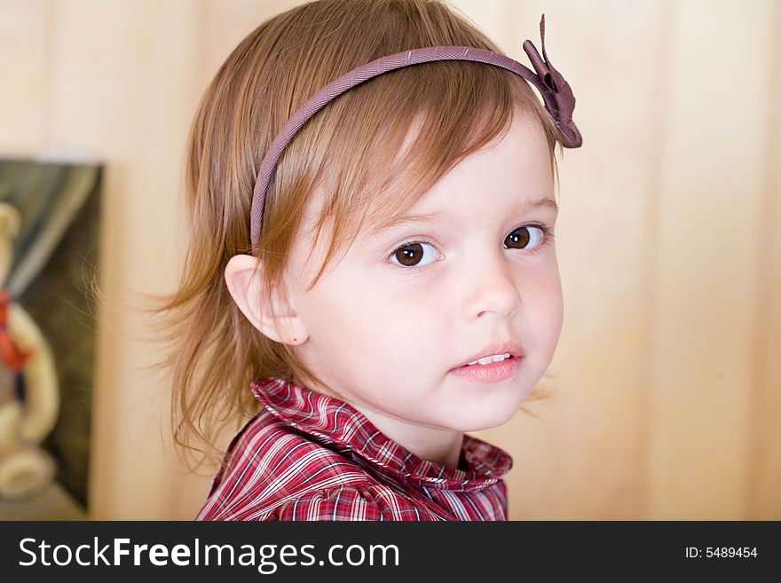 Portrait Of A Little Girl With Bow Knot On Head