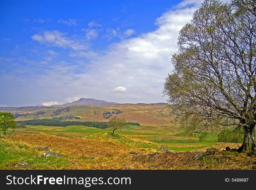 A lovely view of the scottish landscape in early may near glen dochart in scotland. A lovely view of the scottish landscape in early may near glen dochart in scotland