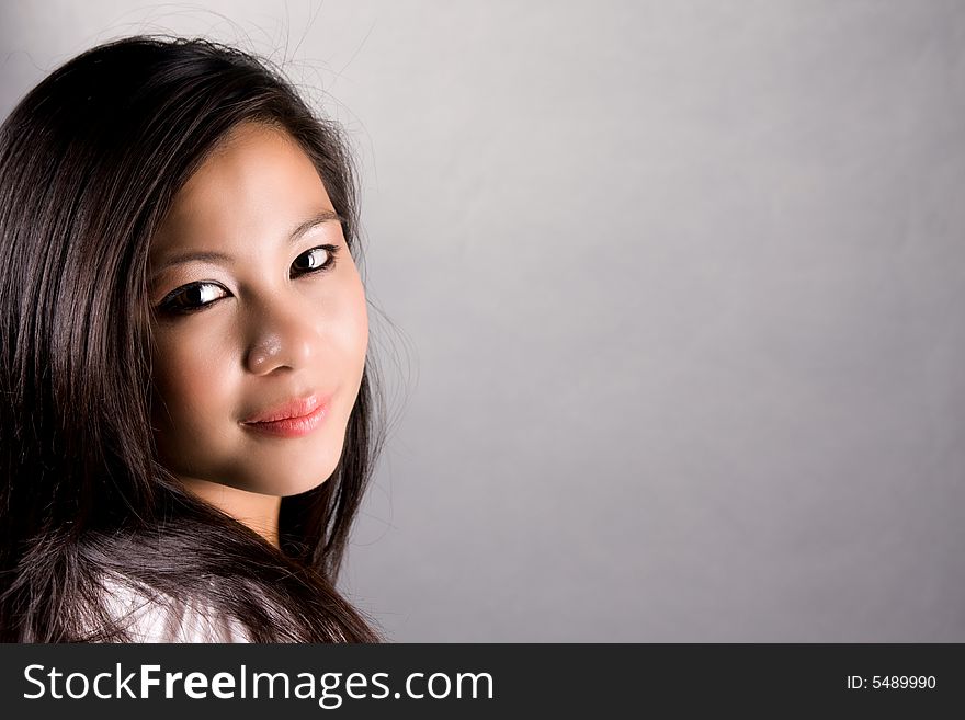 Beautiful asian showing expressive smile. Beautiful asian showing expressive smile