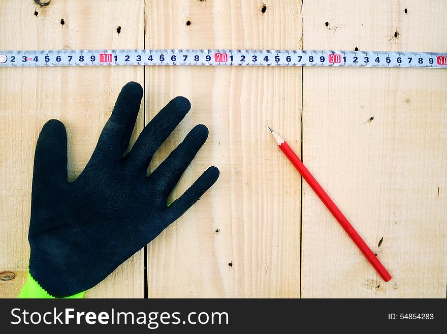 measuring wood planks