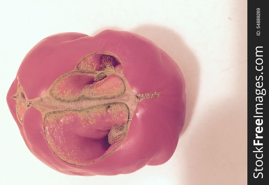 An abducted tomato returned unharmed but carved with the sign of an extraterrestrial culture.