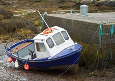 Boat At Low Tide Royalty Free Stock Photography