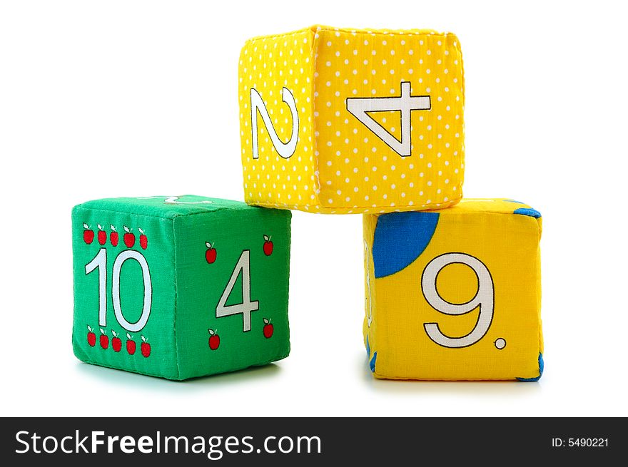 Child's cloth mathematical bricks (blocks) on overwhite background. Child's cloth mathematical bricks (blocks) on overwhite background.