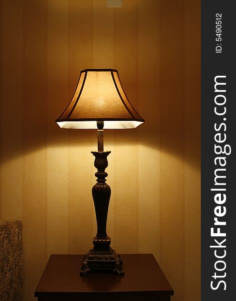 An open standing lamp in living room. An open standing lamp in living room