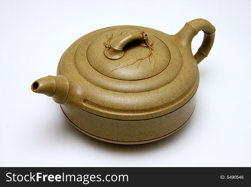 An teapot isolated on white from China.