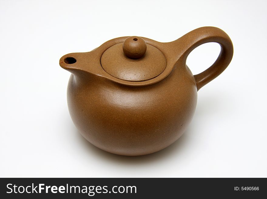 An teapot isolated on white background,it is a artwork.