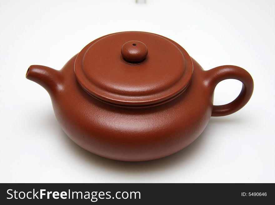 An teapot isolated on white background,also called zisha teapot.