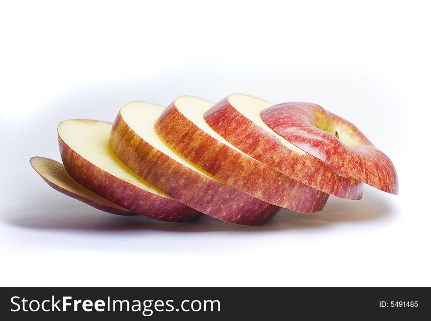 Ripe red apple on a white background