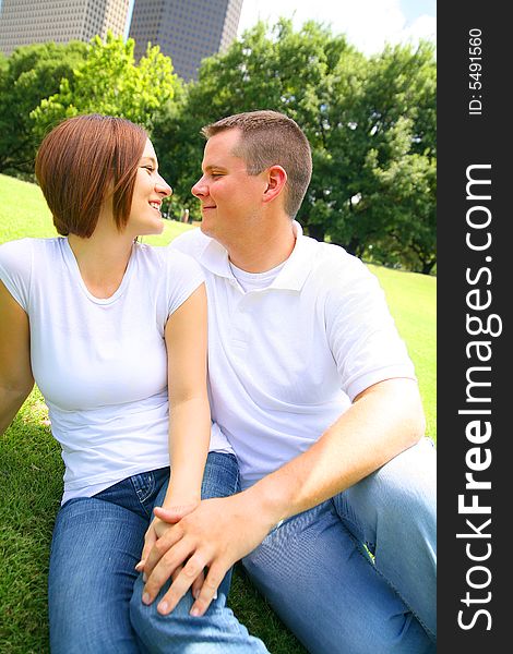 Happy couple embracing outdoor, holding hand and smile. Happy couple embracing outdoor, holding hand and smile