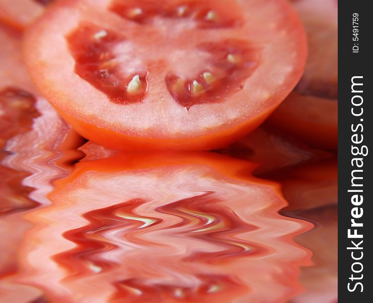 A close up view of slices of roma tomatoes