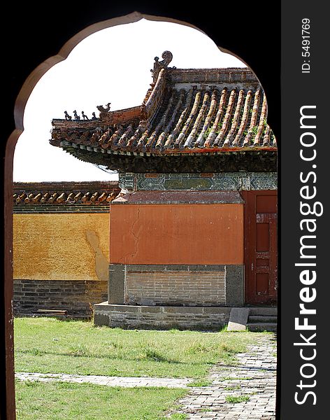 A view through an open door of a temple inside the grounds of Amarbayasgalant Monastery, one of a handful of Buddhist sites still remaining in Mongolia