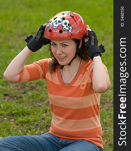 Smiling Sports Girl Outdoors on Green Background