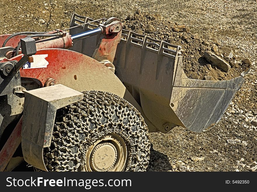 Detail of wheel crawler during earth work.