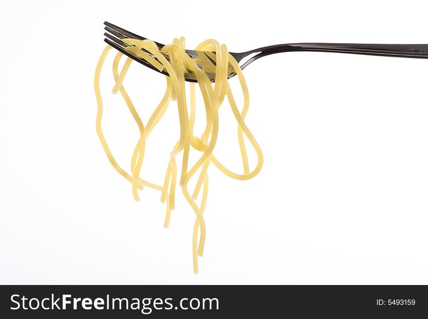 Spaghetti dangling from a fork