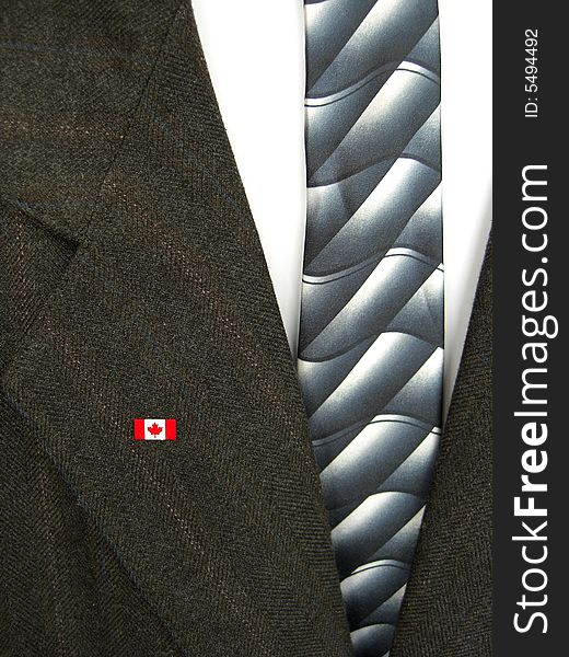 Canadian flag on coat with tie