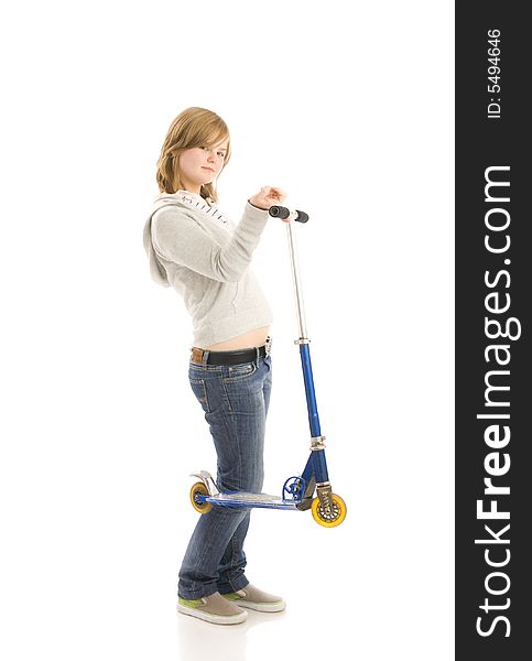 The young beautiful girl with a scooter isolated on a white background