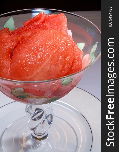 Watermelon in dessert glass on saucer ready to serve or eat