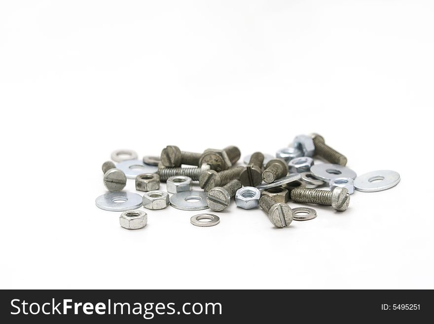 Screws And Bolts - Shallow Depth Of Field isolated on white backround.