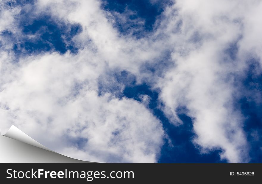 Blue sky background as 3d models of a sheet of a paper of green color with the wrapped up corner. Blue sky background as 3d models of a sheet of a paper of green color with the wrapped up corner