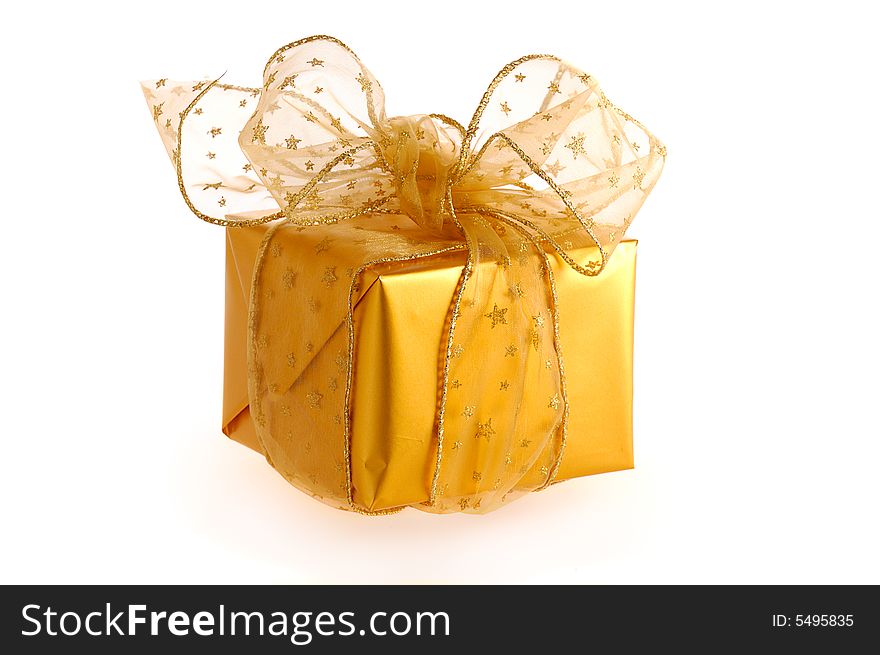 Golden box with golden ribbon