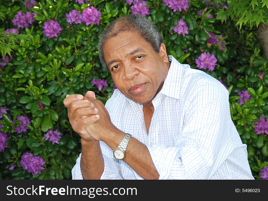 Portrait of a african american male outside.