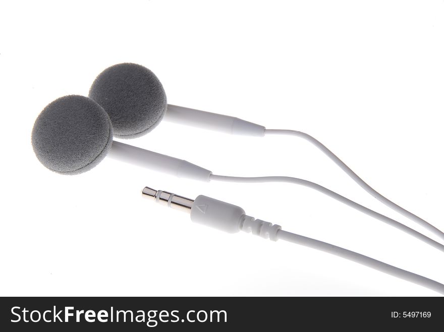 White earphones for mp3-player on white background