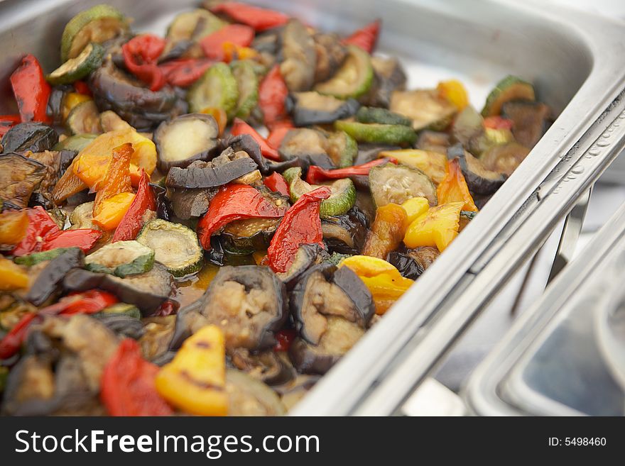 Grilled vegetables in metal sausepan