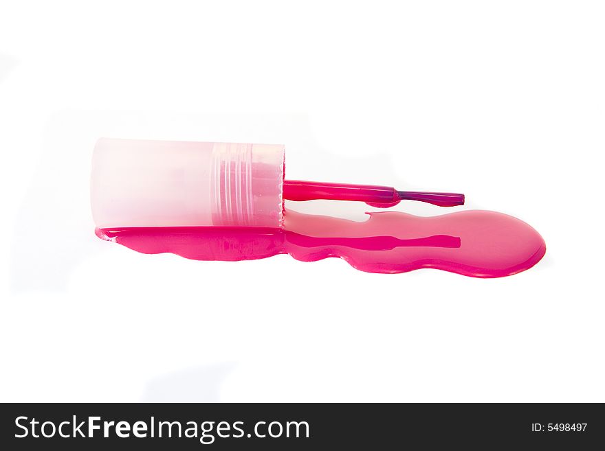 Pink enamel with brush isolated on white