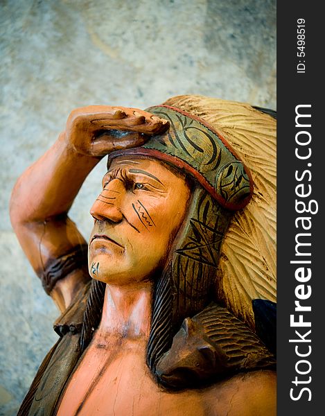 An image of a cigar Indian statue