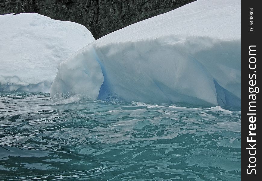 View from the sailing ship Europa on a mountain range in Antarctica , icebergs. View from the sailing ship Europa on a mountain range in Antarctica , icebergs