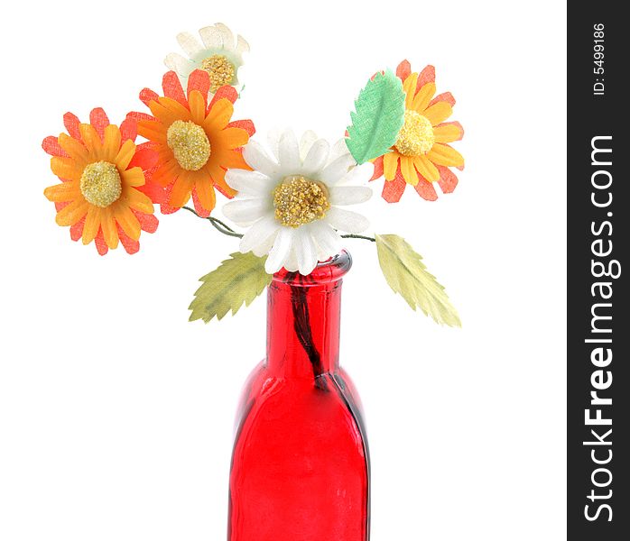 Red  decorated bottle with flowers on white. Red  decorated bottle with flowers on white