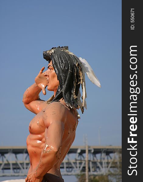 Mardi Gras float character indian with blue sky background. Mardi Gras float character indian with blue sky background.