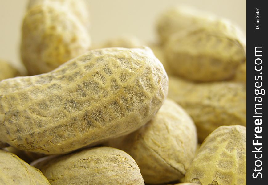 Closeup of peanuts in bowl.