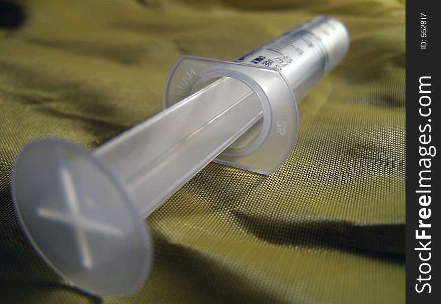 Closeup of syringe.