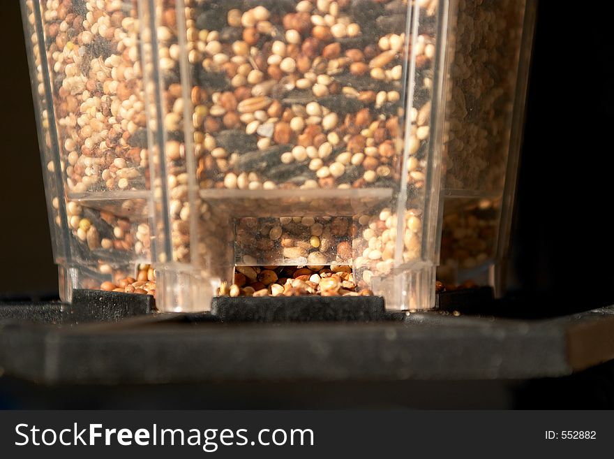 A close up view of a bird feeder. A close up view of a bird feeder