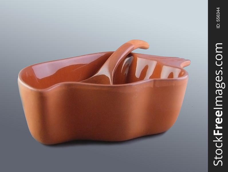 Ceramic Adobe Party Bowl with scalloped edges and spoon for dip. Ceramic Adobe Party Bowl with scalloped edges and spoon for dip