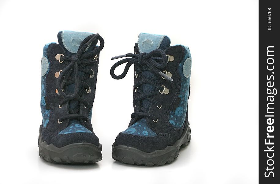 Isolated childrens winter boots. Isolated childrens winter boots