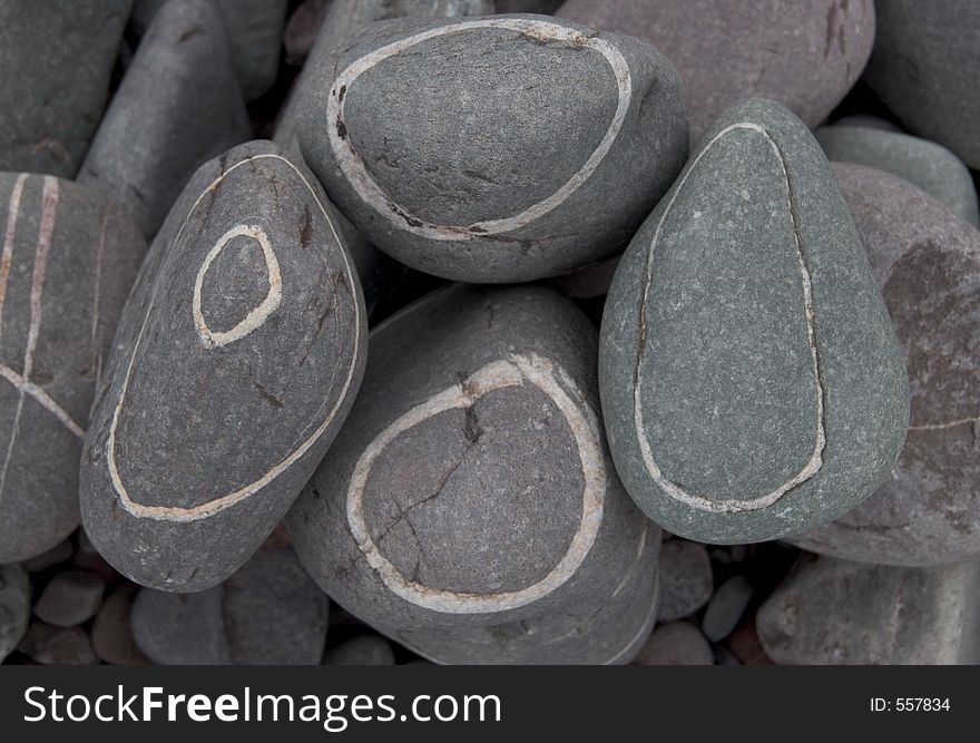 Beach pebbles with strange markings