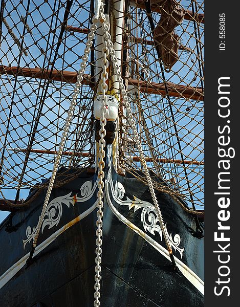 Old sailing ship against blue sky