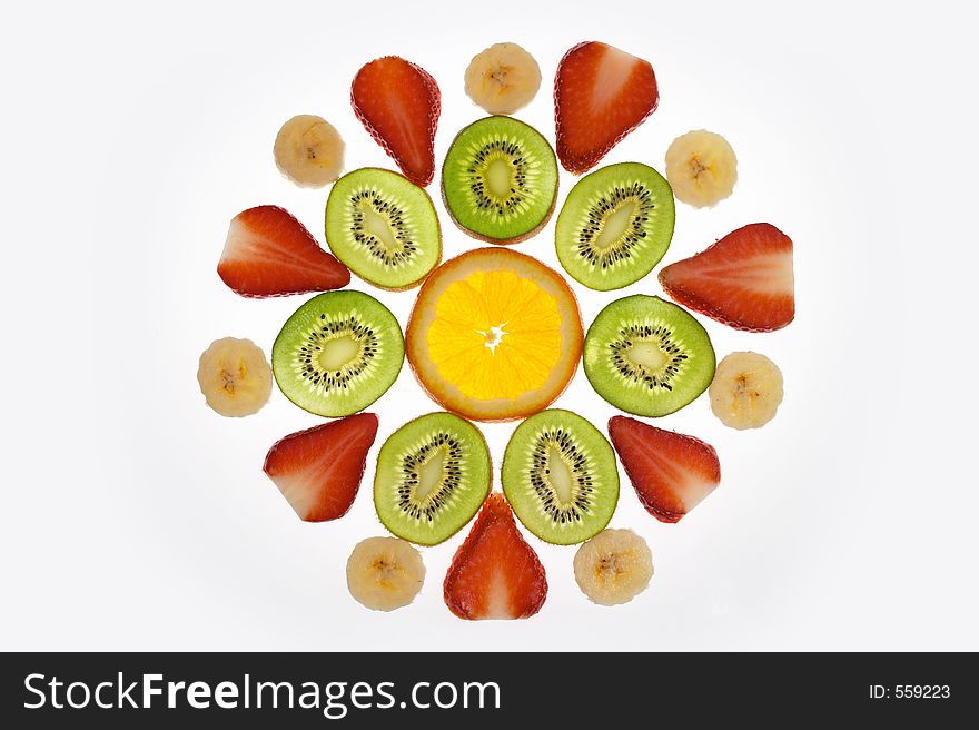 An arrangement of an assortment of fruit. An arrangement of an assortment of fruit