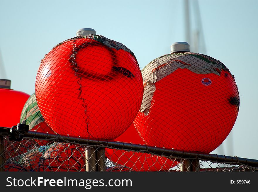 A couple of ball-taps on a boat berthed in the harbour