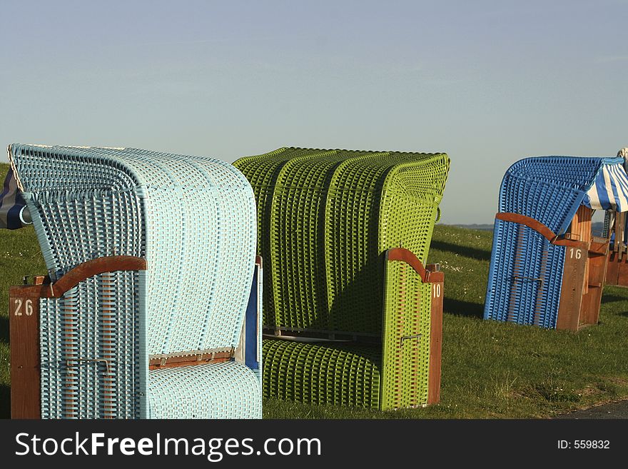 Arrangement of differently couloured beach chairs. Arrangement of differently couloured beach chairs