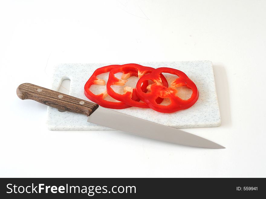 Red pepper on white w/knife