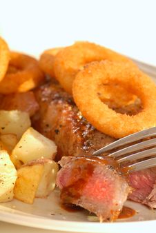 New York Cut Strip Steak With Onion Rings Royalty Free Stock Photo New York Cut Strip Steak With Onion Rings Royalty Free Stock Photo